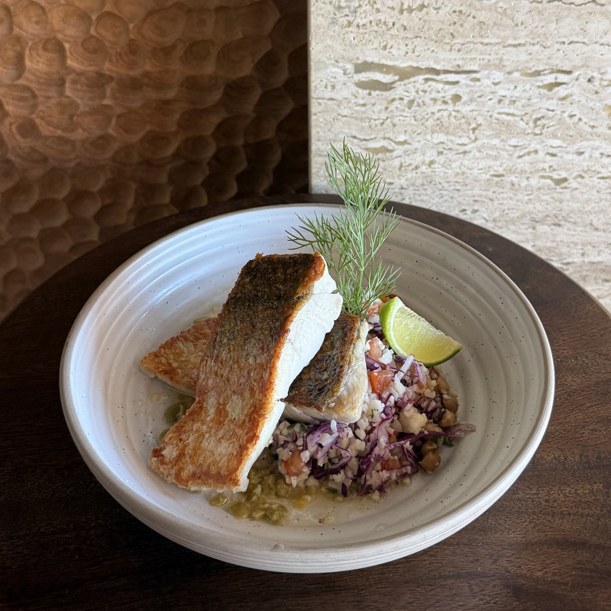 Pan seared Barramundi Salad with charred chickpea caulirice